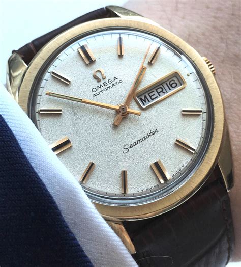 omega seamaster day date gold|omega speedmaster automatic day date.